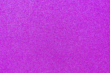 Texture of wrapping paper from  shiny glitter. Defocus, abstract background.