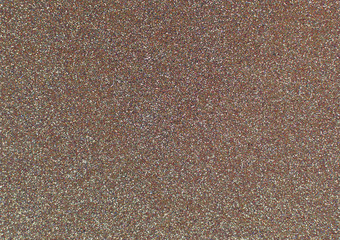 Texture of wrapping paper from  shiny glitter. Defocus, abstract background.