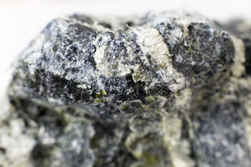 Mineral asbestos macro photography. Harmful, dangerous minral. Asbestos fibers in rock close-up.