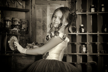 Vintage portrait of little girl in purple dress