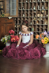 Vintage portrait of little girl in purple dress