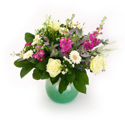 Large elegant bouquet with a variety multicolored flowers of different species isolated on white background