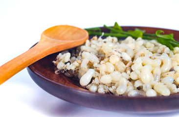 Fresh Red ant eggs are larvae of ants in wood dish ware .
