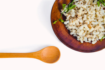 Fresh Red ant eggs are larvae of ants in wood dish ware .