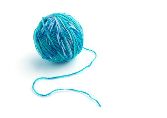 Ball of yarn on white background