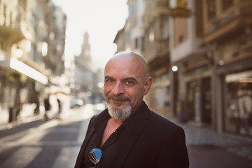 Senior man posing in city lifestyle image