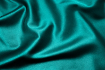 Green satin fabric as background