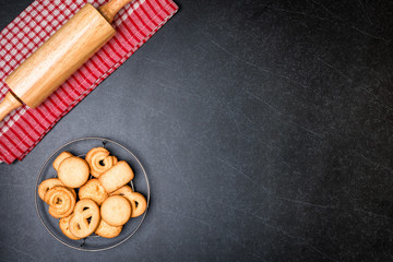 Cookies on Black stone table background.