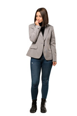 Fototapeta premium A full-length shot of a Young business woman having doubts over isolated white background