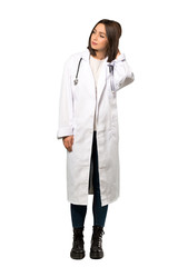 A full-length shot of a Young doctor woman having doubts while scratching head over isolated white background