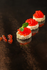 red caviar (sandwich with red snack - buffet) salmon fish, seafood. food background. top view.