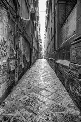 Naples, Italy - August 16, 2015 : Narrow streets of Naples, black and white photographs.