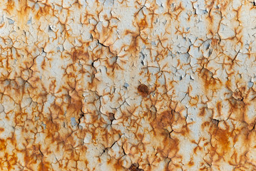 metal wall cracked with paint and rust. old wall background.
