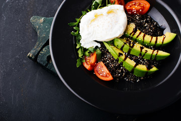 Healthy food concept, morning breakfast, tomatoes, eggs, avocado, salad