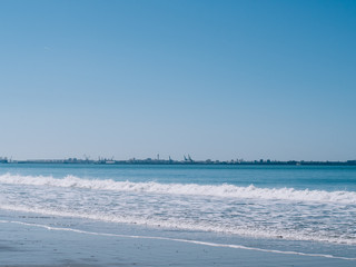 Shore of the beach with clear water