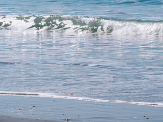 Shore of the beach with clear water