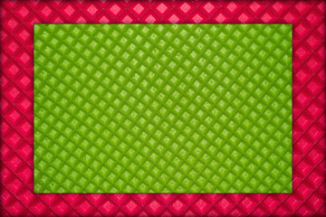 Obraz premium pink frame with waffle green texture