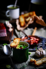 Brussels sprouts soup with bacon.dark photo