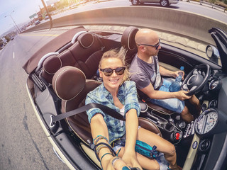 Happy couple in the car