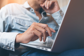 Working on laptop computer