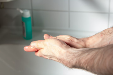 correct hands disinfection with disinfectant and water