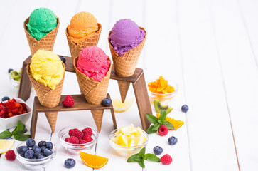 Various homemade fruit ice cream in the cone 
