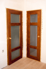 Fototapeta na wymiar beautiful installed wooden doors in the house