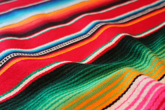 Mexican poncho cinco de mayo mexico blanket rug background  backdrop traditional Mexican  poncho fiesta background with stripes stock, photo, photograph, image, picture