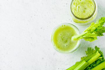 Green detox celery juice in a glass.
