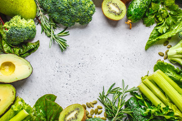 Green food background, copy space. Healthy green vegetables and fruits, top view.