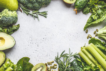 Green food background, copy space. Healthy green vegetables and fruits, top view.