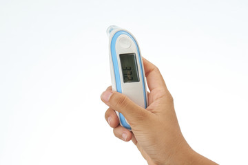 Hand holding digital thermometer