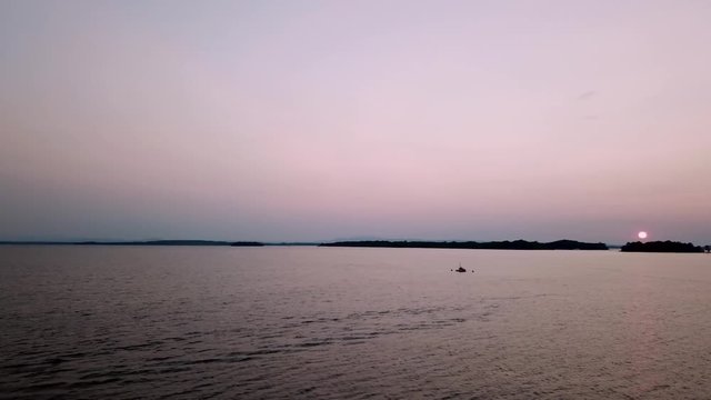 Pink sunset over lake - Drone