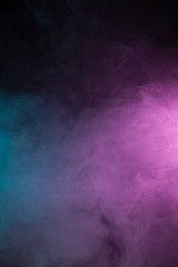 Colorful smoke on black background