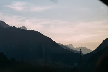 view from the window on Dolomites, Italy. the mountains are cove