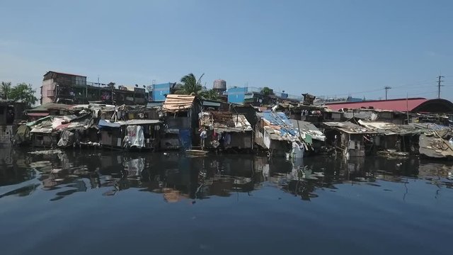Aerial of Slum Area along the polluted canal in Tondo Manila, Philippines