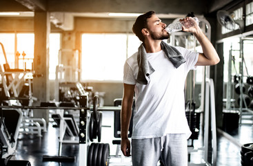 Young sport man athlete with handkerchief relax after break workout