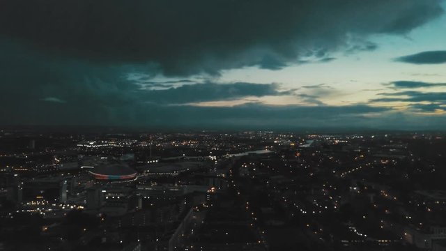Aerial Drone Shot of Glasow, Scotland at night with beautiful lights everywhere