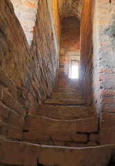 narrow and steep staircase leading to the top of the medieval to