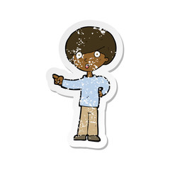 retro distressed sticker of a cartoon pointing boy