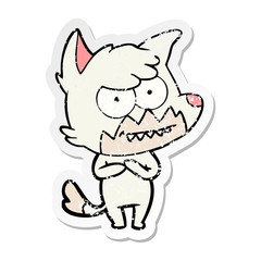 distressed sticker of a cartoon grinning fox
