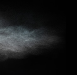 Dust cloud on black background