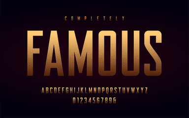 Condensed uppercase letters and numbers, alphabet with effect of the gold foil.  © rikkyal