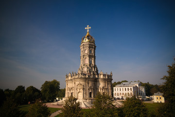 Fototapeta na wymiar Exterior view of Church of Sign of Blessed Virgin in Dubrovitsy Znamenskaya church, Podolsk Moscow region, Russia