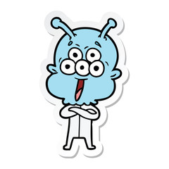 sticker of a happy cartoon alien