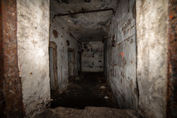 Fototapeta na wymiar abandoned corridors of post soviet rocket launch base in latvia