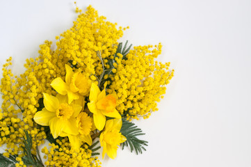 Beautiful yellow flowers. Gift bouquet. Mimosa and daffodils.