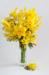 Bouquet of spring flowers in a vase. March 8.