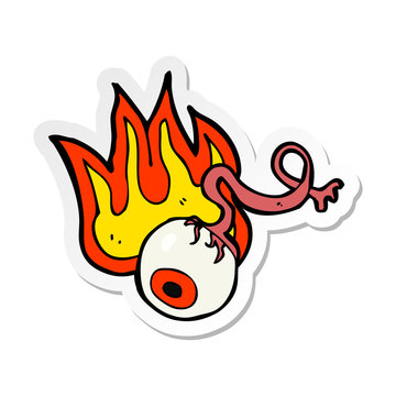 sticker of a cartoon gross flaming eyeball