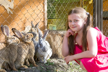 a girl and rabbits